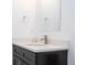 Close-up of stylish bathroom vanity with a modern faucet and mirror at 15760 Sw 55Th Avenue Rd, Ocala, FL 34473