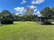 Well-maintained community grounds featuring lush green spaces and gazebo at 1695 Lee Rd # B109, Winter Park, FL 32789