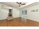 Bright living room featuring hardwood floors, a sliding glass door, and an open floor plan at 2006 N Westmoreland Dr, Orlando, FL 32804