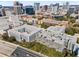 Stunning aerial view of apartment community with parking garage and cityscape backdrop at 206 E South St # 1030, Orlando, FL 32801