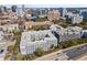 Aerial shot showcasing community buildings, parking, and downtown skyline at 206 E South St # 1030, Orlando, FL 32801