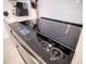 Close up of modern induction stove top, featuring easy to use digital controls at 2377 Reading Trl, Kissimmee, FL 34746