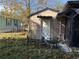 Charming backyard featuring a shed and outdoor seating, creating a welcoming and functional outdoor space at 2429 S Elm Ave, Sanford, FL 32771