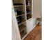 Built-in storage shelves with various household items and supplies at 2429 S Elm Ave, Sanford, FL 32771