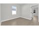 A minimalist bedroom with hardwood floors and a window at 420 Marion Oaks Crse, Ocala, FL 34473