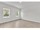 Neutral bedroom with natural light and wood floors at 420 Marion Oaks Crse, Ocala, FL 34473