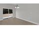 Well-lit dining area with sliding door to backyard, with neutral-colored flooring at 420 Marion Oaks Crse, Ocala, FL 34473