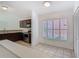 An eat-in kitchen area provides bright light and a view of the kitchen and pantry at 4371 Weeping Willow Cir, Casselberry, FL 32707