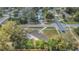 An aerial view of a single-story home in a suburban neighborhood shows its proximity to neighborhood streets at 5108 Balboa Dr, Orlando, FL 32808