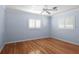 Empty bedroom with hardwood floors, neutral walls, and white trim. Ready for your personal touch! at 625 Brechin Dr, Winter Park, FL 32792