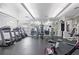 Well-equipped fitness center with treadmills, elliptical machines, and weight training equipment at 6542 Swissco Dr # 813, Orlando, FL 32822