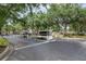 Gated entrance of Crestview with landscaped sign at 7123 Yacht Basin Ave # 328, Orlando, FL 32835