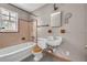 Bathroom featuring a combination tub and shower, as well as a tiled floor at 728 N Summerlin Ave, Orlando, FL 32803