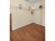 Walk-in closet with wire shelving and hardwood floors at 7296 Sw 115Th Pl, Ocala, FL 34476