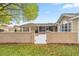 An inviting walkway leads to a spacious courtyard, perfect for relaxing or entertaining guests at 7296 Sw 115Th Pl, Ocala, FL 34476