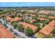 An aerial view highlighting the neighborhood's beautiful landscaping, sidewalks and residential character at 7614 Acklins Rd, Kissimmee, FL 34747