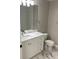 Bright bathroom features a marble countertop and a clean, well-lit space at 7727 Harbor Lake Dr, Orlando, FL 32822