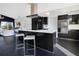 Kitchen with center island, stainless steel appliances, and open view to the living room at 8076 Aspencrest Ct, Orlando, FL 32835