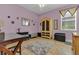 Bedroom features a faux fur rug, armoire, and a window for natural light at 824 Preserve Ter, Lake Mary, FL 32746