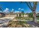 Charming single-story home with a three-car garage, manicured landscaping, and a welcoming entrance at 824 Preserve Ter, Lake Mary, FL 32746