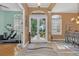 Inviting foyer featuring tiled floors, decorative sidelights, and a clear view of the front doors at 824 Preserve Ter, Lake Mary, FL 32746