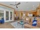 Cozy living room flows into the dining area, providing seamless space for relaxation and socializing at 824 Preserve Ter, Lake Mary, FL 32746