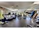 Well-equipped gym with modern exercise machines and ample space for a complete workout at 8443 Via Bella Notte, Orlando, FL 32836