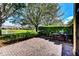 Outdoor patio with brick pavers, dining set and lush green views in a tranquil setting at 8443 Via Bella Notte, Orlando, FL 32836