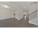 Spacious foyer featuring tile floors and staircase, leading to open concept living areas at 9014 Sonoma Coast Dr, Winter Garden, FL 34787