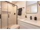 This bathroom features a glass shower, updated fixtures, and a modern aesthetic at 913 Lake Ave, Edgewater, FL 32132