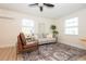 Cozy living room area with stylish decor and natural light from two windows at 913 Lake Ave, Edgewater, FL 32132