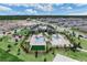 Overhead shot showcasing community pool and volleyball court at 9752 Petition Way, Orlando, FL 32832