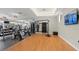 Spacious fitness center offering cardio equipment, weights, and a dedicated workout area with scenic views at 9752 Petition Way, Orlando, FL 32832