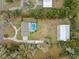 Expansive property featuring a home, pool, large metal building, and a generous yard, all within a defined boundary at 1134 Glenwood Rd, Deland, FL 32720