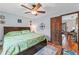 Well-lit bedroom with a comfortable bed and a view to the office at 1134 Glenwood Rd, Deland, FL 32720