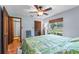Spacious bedroom featuring natural light, hardwood floors, and ample closet space at 1134 Glenwood Rd, Deland, FL 32720