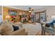 Comfortable living room with a stone fireplace and a cozy sofa at 1134 Glenwood Rd, Deland, FL 32720
