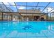 Enjoy the backyard with a screened-in pool and plenty of seating for outdoor relaxation at 1134 Glenwood Rd, Deland, FL 32720