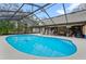 Screened in pool and covered patio for outdoor relaxation and entertainment at 1134 Glenwood Rd, Deland, FL 32720