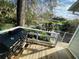 Inviting back deck featuring a grill and backyard views of nature and waterways at 124 Godfrey Rd, Edgewater, FL 32141
