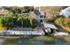 Waterfront house with a private boat lift and dock, providing easy access to the water at 124 Godfrey Rd, Edgewater, FL 32141