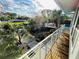 Exterior view from the porch showcasing landscaping, backyard, hot tub, and swimming pool at 124 Godfrey Rd, Edgewater, FL 32141