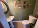 Cozy powder room featuring updated fixtures and decor at 124 Godfrey Rd, Edgewater, FL 32141