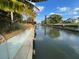 A canal view of the waterway, providing access to boating and water activities, with homes and docks visible along the shore at 124 Godfrey Rd, Edgewater, FL 32141