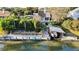 Stunning waterfront home featuring a private dock and boat lift, perfect for enjoying water activities at 124 Godfrey Rd, Edgewater, FL 32141
