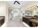 Primary bathroom featuring a shower, a soaking tub, and granite countertops at 1312 Winter Springs Blvd, Winter Springs, FL 32708