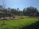 Community playground with various play structures, providing a fun and engaging outdoor space for children at 14214 Shocklach Dr, Winter Garden, FL 34787