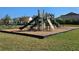 Fun-filled community playground with various play structures, offering children an engaging and active outdoor space at 14214 Shocklach Dr, Winter Garden, FL 34787
