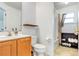 Bright bathroom with tiled floors, single sink vanity, and a shower-tub combination at 154 Desiree Aurora St, Winter Garden, FL 34787