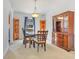 Traditional dining room featuring a wooden table, chairs, and a hutch at 154 Desiree Aurora St, Winter Garden, FL 34787